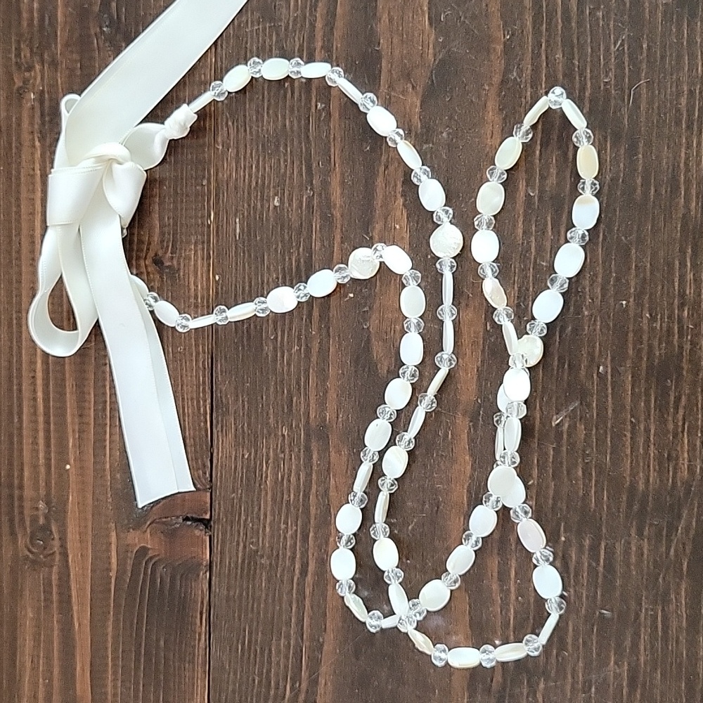 White bead necklace with tie bow closure
